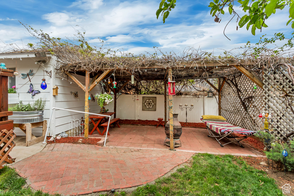 View of patio / terrace featuring fence