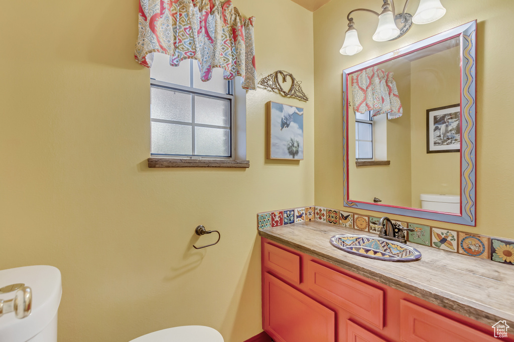 Bathroom with toilet and vanity