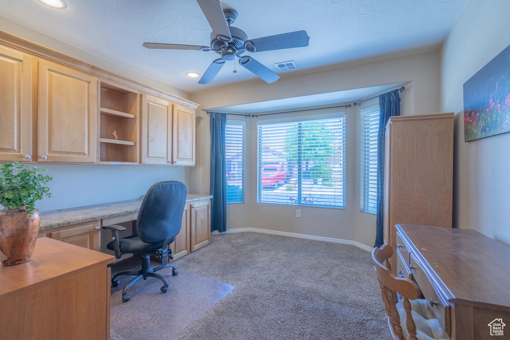 Office area with built in study area, carpet flooring, ceiling fan, baseboards, and recessed lighting