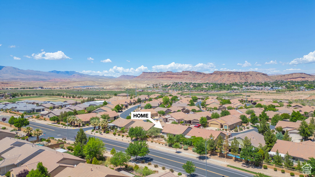 Aerial view of residential area with mountains