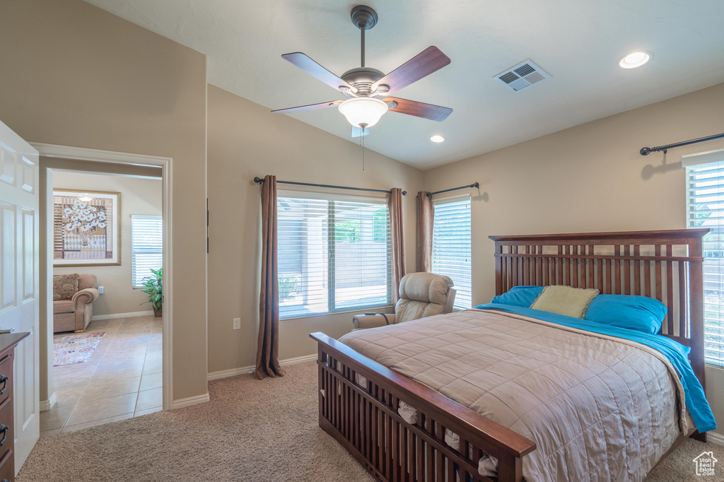 Bedroom with carpet, baseboards, lofted ceiling, ceiling fan, and recessed lighting