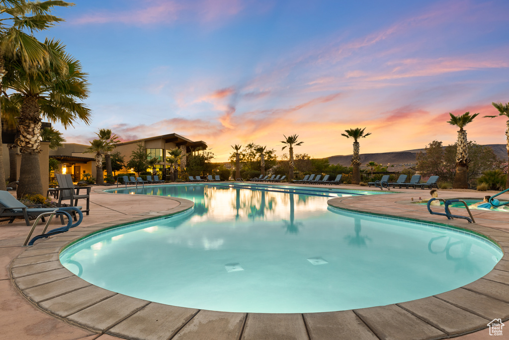 Community pool featuring a patio