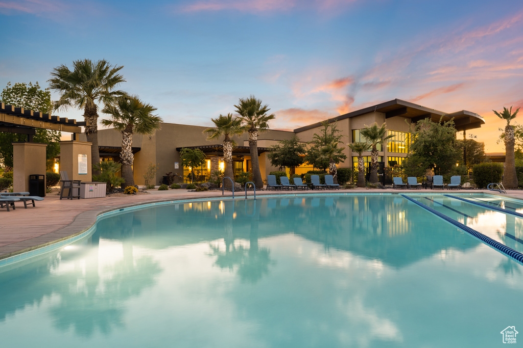 Community pool featuring a patio