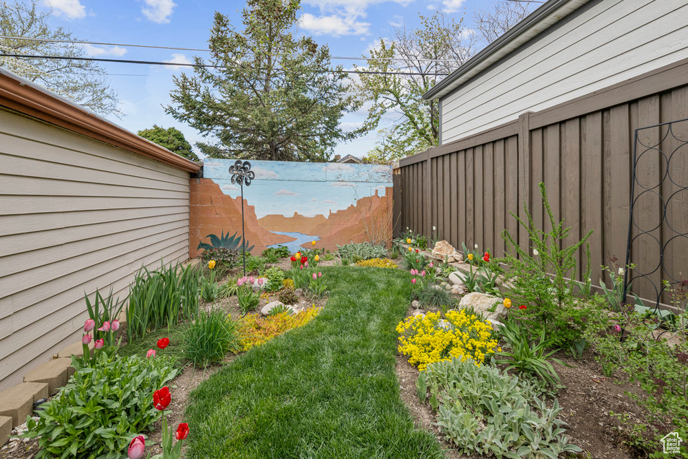 View of yard with fence