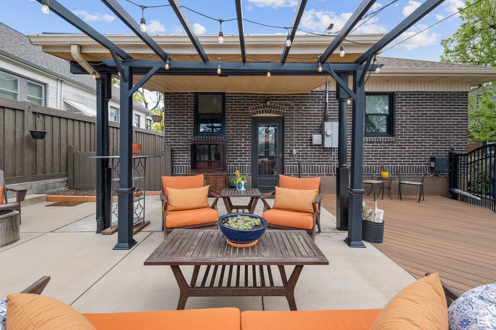 View of patio / terrace with a fenced backyard, a deck, and an outdoor hangout area