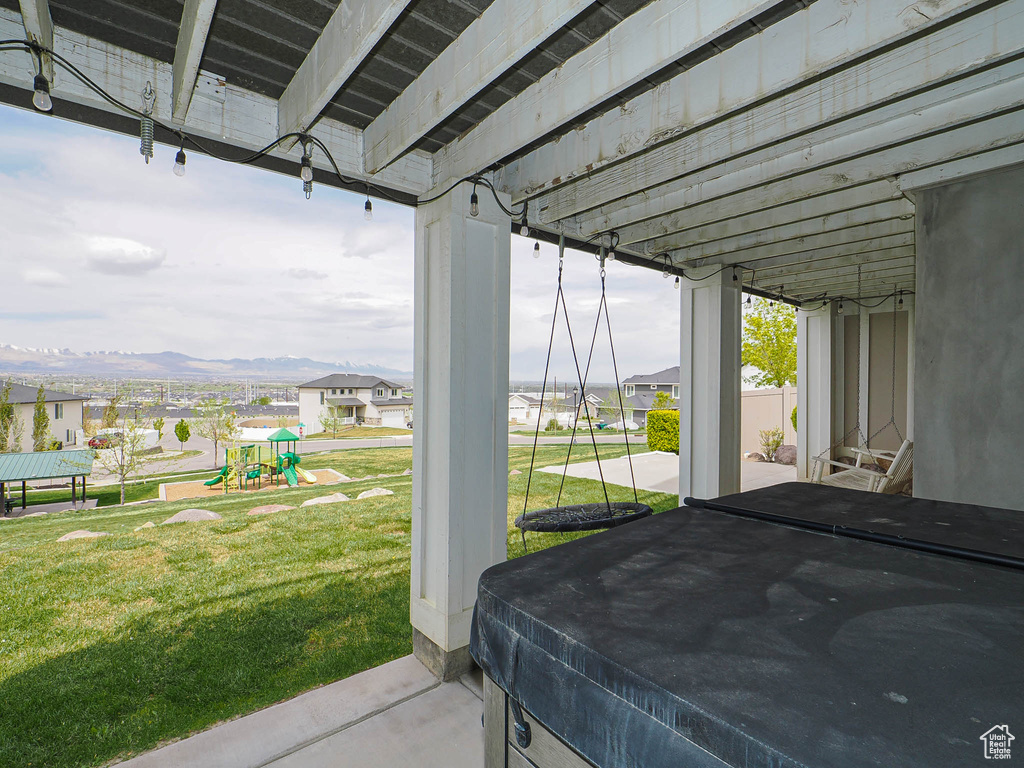 View of patio / terrace with a residential view and a playground