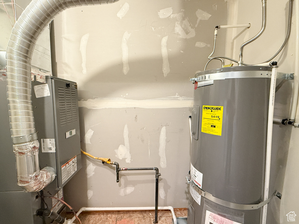 Utilities featuring strapped water heater