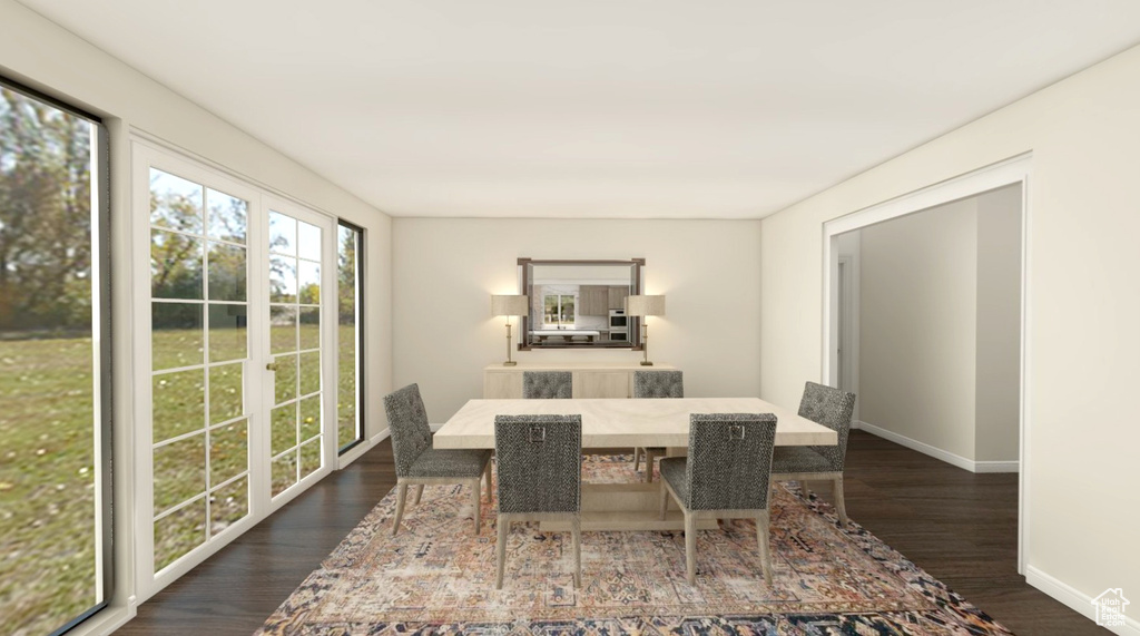 Dining area featuring baseboards and dark wood-style floors