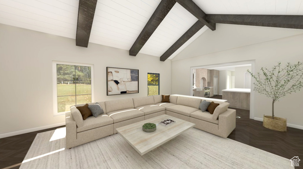 Living room featuring baseboards and lofted ceiling with beams