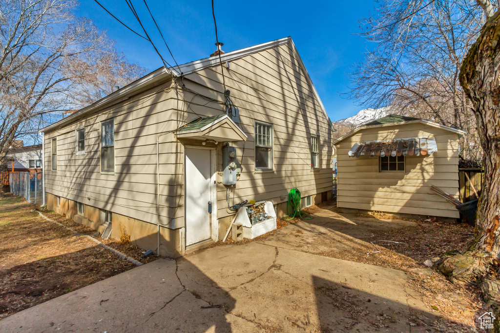 Back of house with a patio area