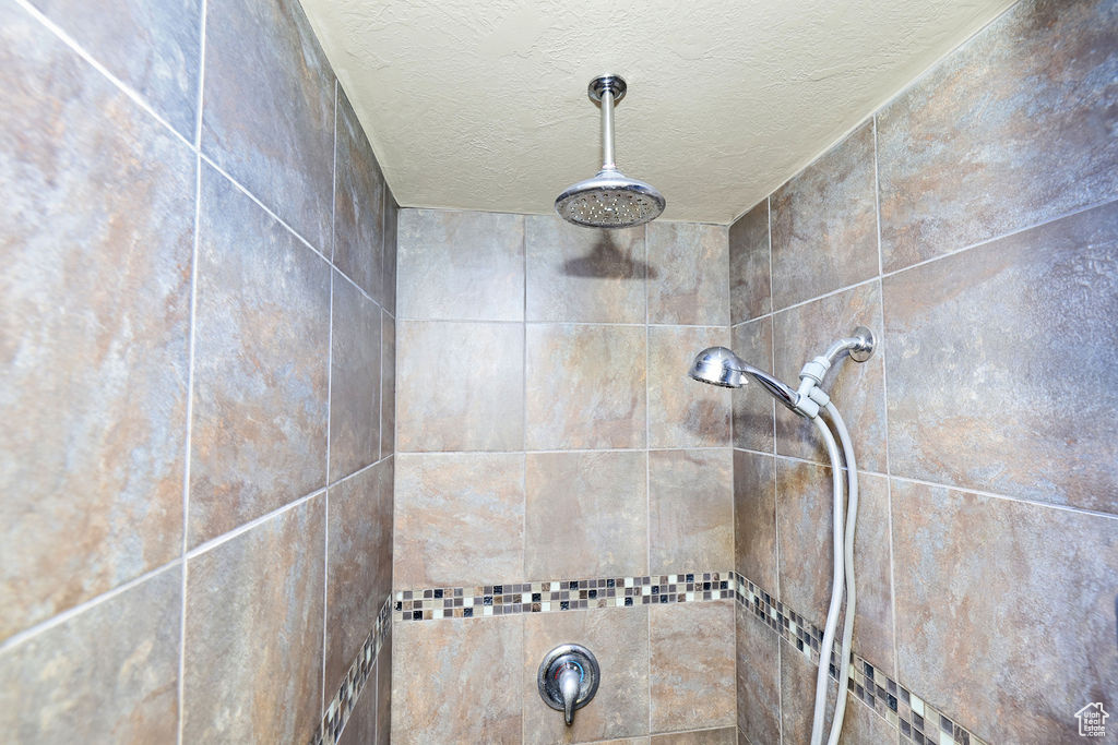 Details featuring tiled shower