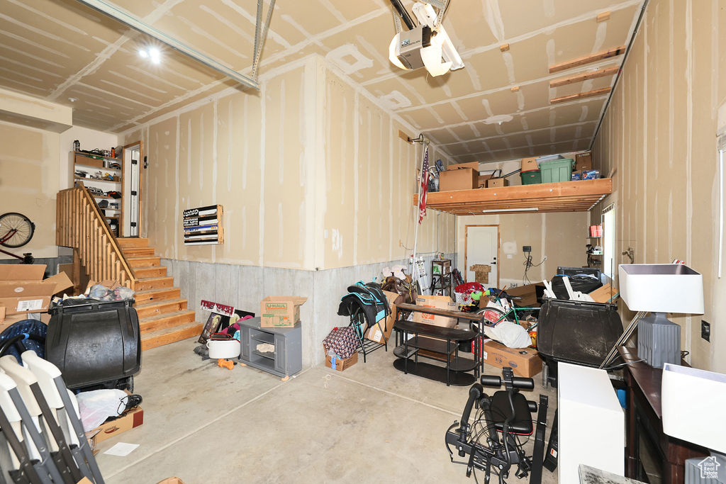 Garage featuring a garage door opener