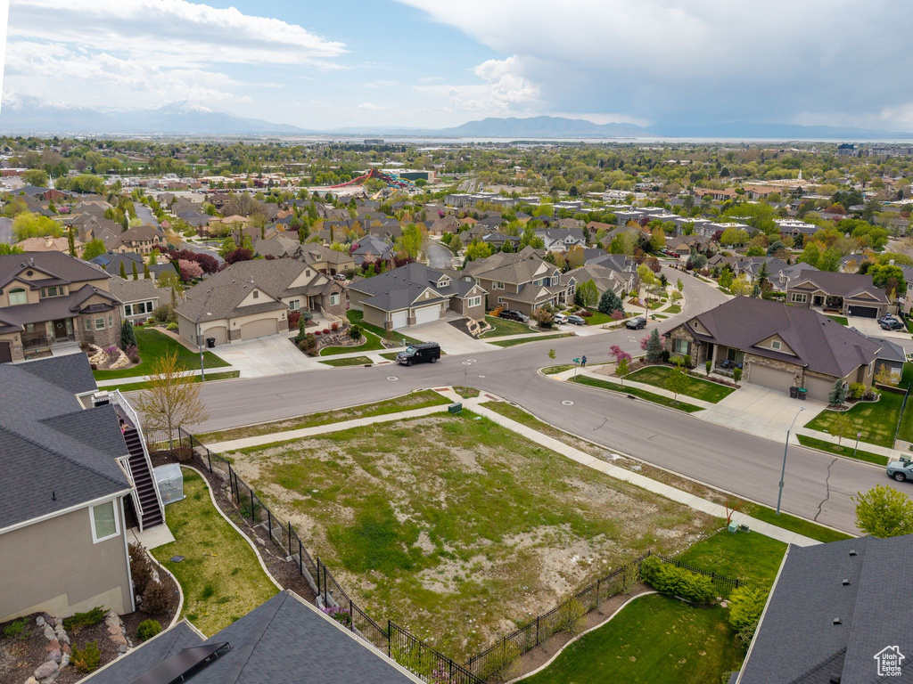 Birds eye view of property featuring a residential view and a mountain view