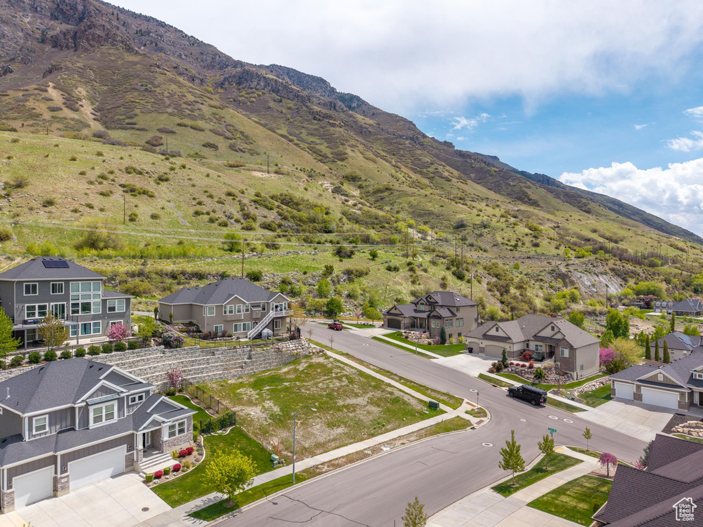 Property view of mountains featuring a residential view