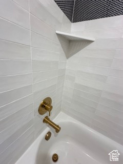 Bathroom with shower / bathtub combination