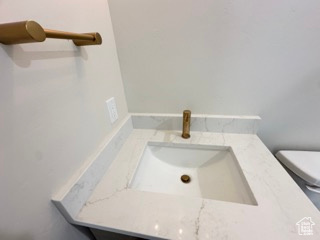 Bathroom with toilet and vanity