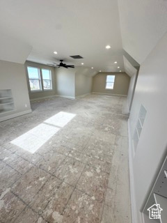 Bonus room featuring a wealth of natural light, a ceiling fan, and recessed lighting