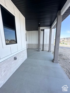 View of patio / terrace with an attached carport