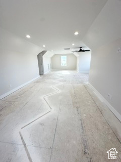 Bonus room with baseboards, recessed lighting, ceiling fan, and vaulted ceiling