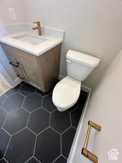 Bathroom featuring toilet and vanity