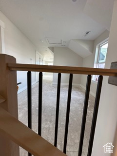 Stairway featuring carpet and baseboards
