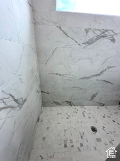 Bathroom with a tile shower