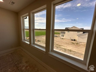 Entryway featuring visible vents and baseboards