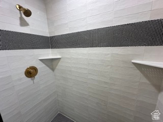 Details featuring tiled shower