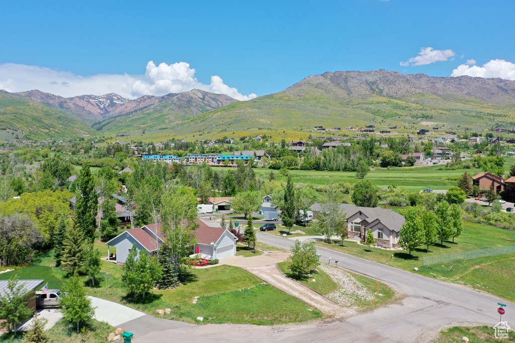 Birds eye view of property featuring a residential view and a mountain view