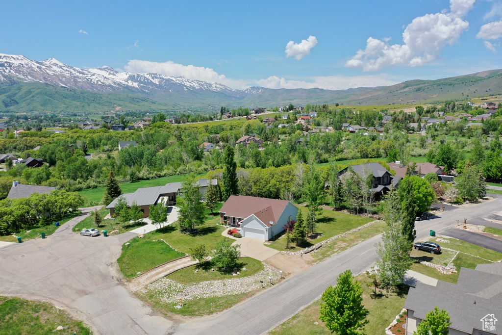 Drone / aerial view featuring a mountain view and a residential view