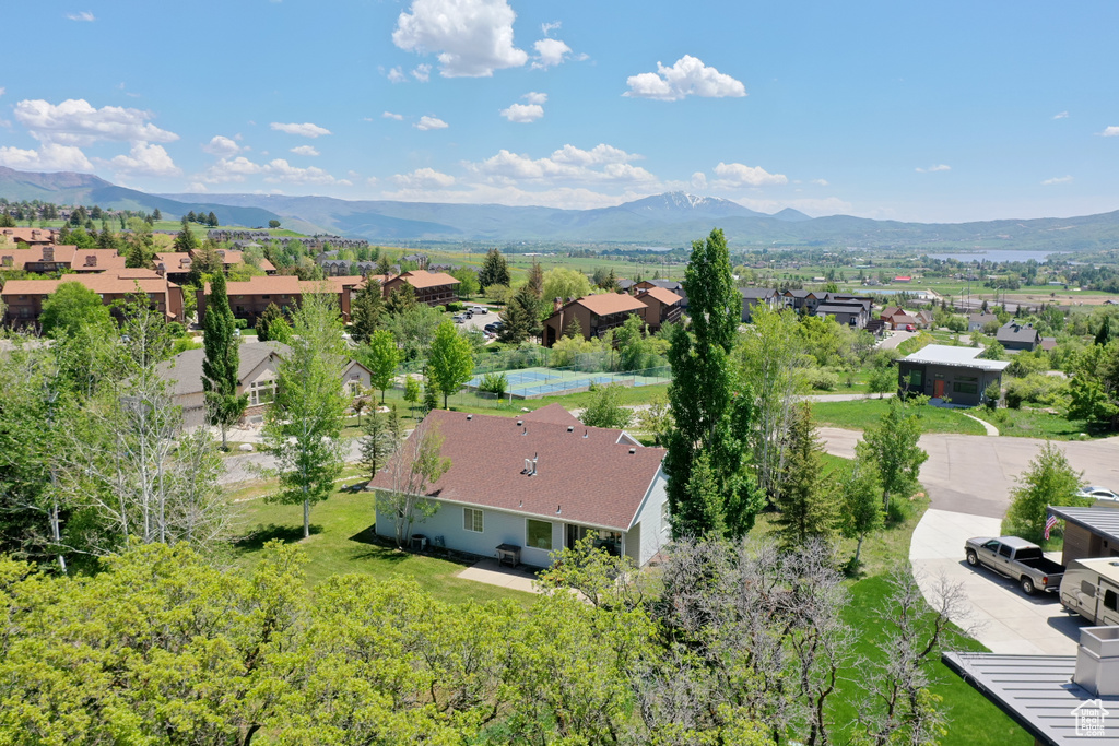 Birds eye view of property featuring a residential view and a mountain view