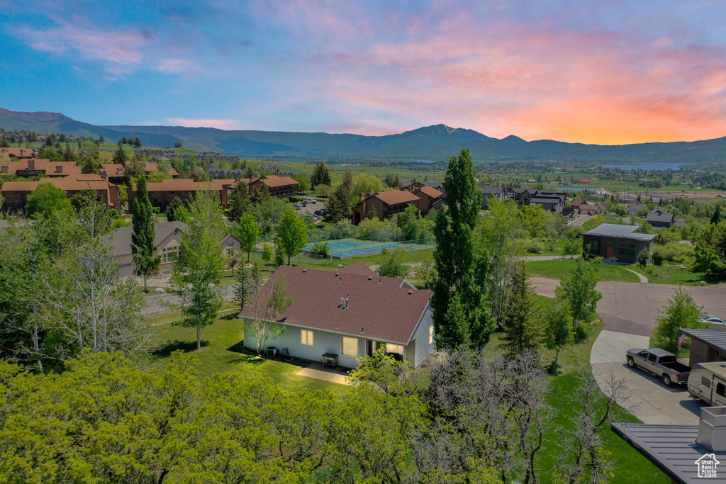 Drone / aerial view featuring a mountain view and a residential view