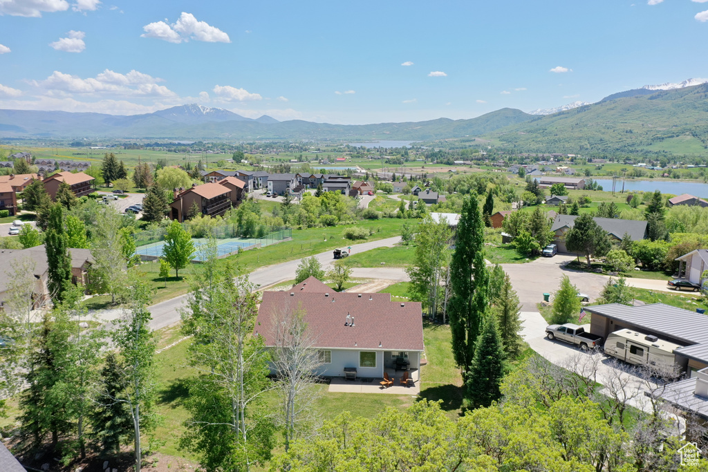 Aerial view featuring a residential view and a water and mountain view