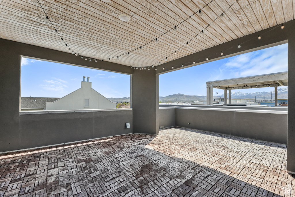 View of patio / terrace featuring a mountain view