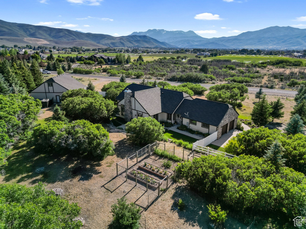 View of subject property with a mountainous background