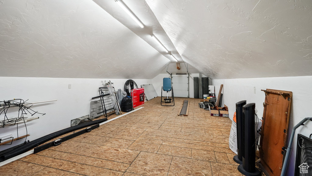 Exercise area with vaulted ceiling