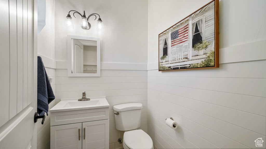 Half bath with toilet and vanity