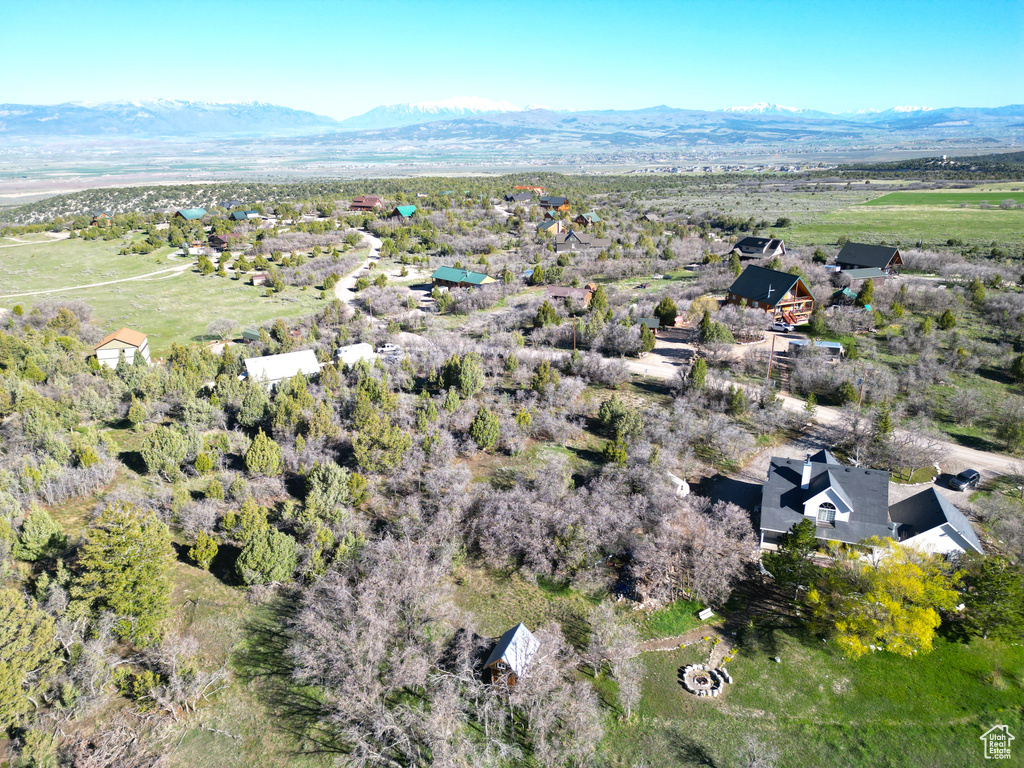 Birds eye view of property featuring a mountain view