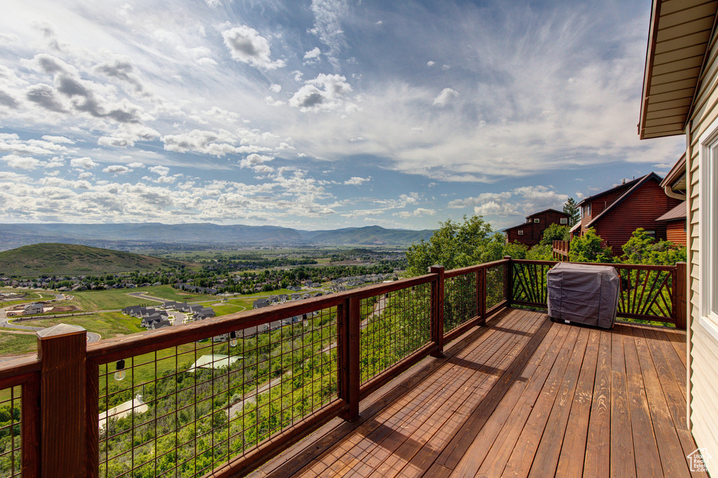 Deck featuring area for grilling and a mountain view