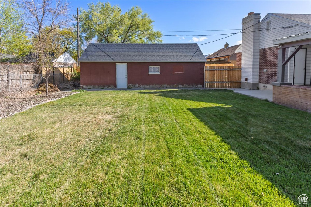 View of yard with a fenced backyard