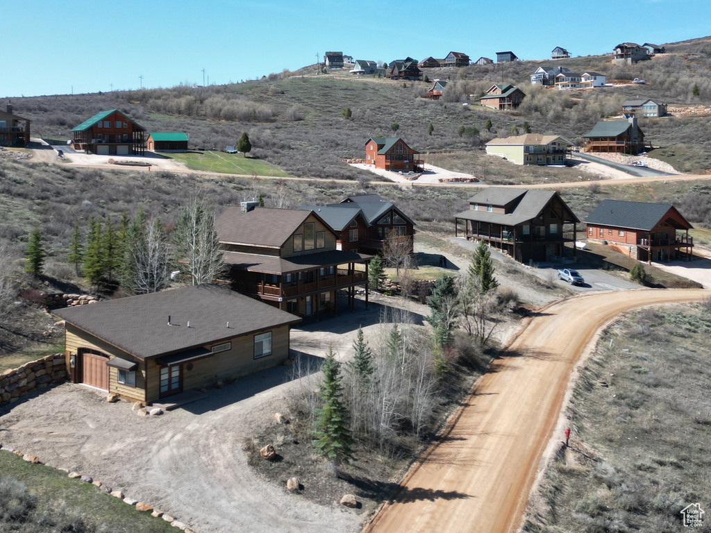Birds eye view of property featuring a rural view