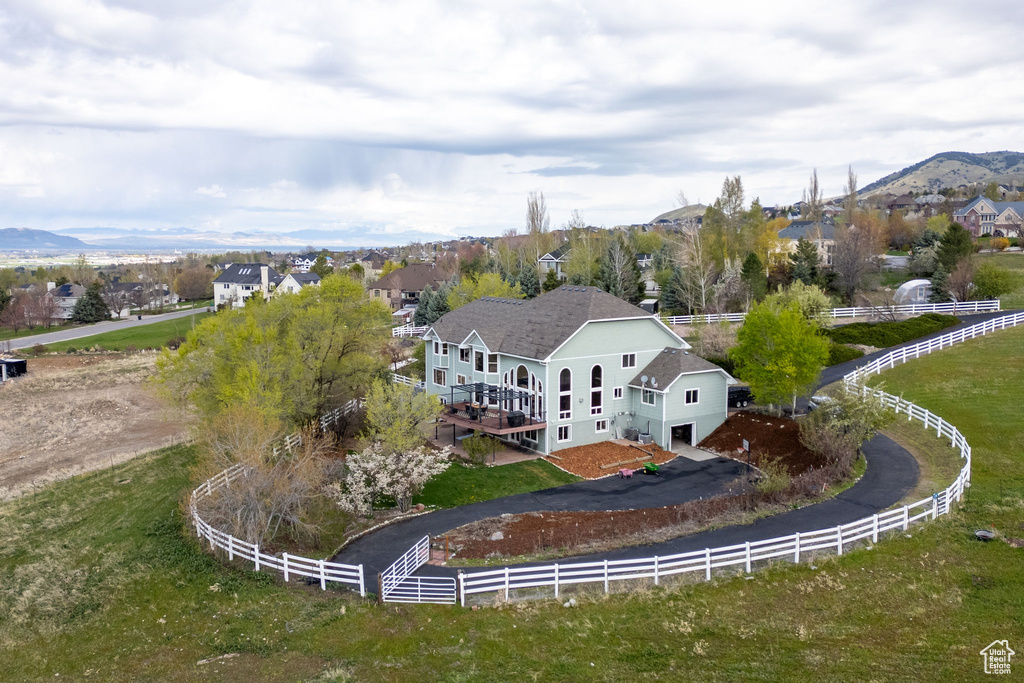 Birds eye view of property with a mountain view