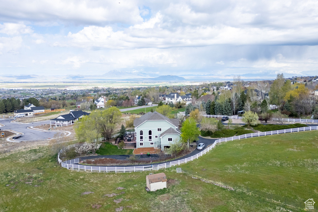 Birds eye view of property featuring a mountain view