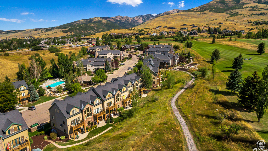 Drone / aerial view featuring a mountain view and a residential view