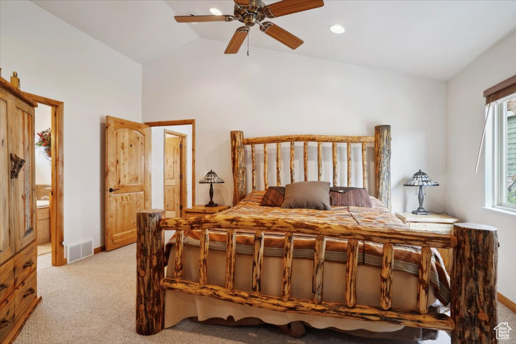 Bedroom featuring high vaulted ceiling, a ceiling fan, visible vents, baseboards, and light colored carpet