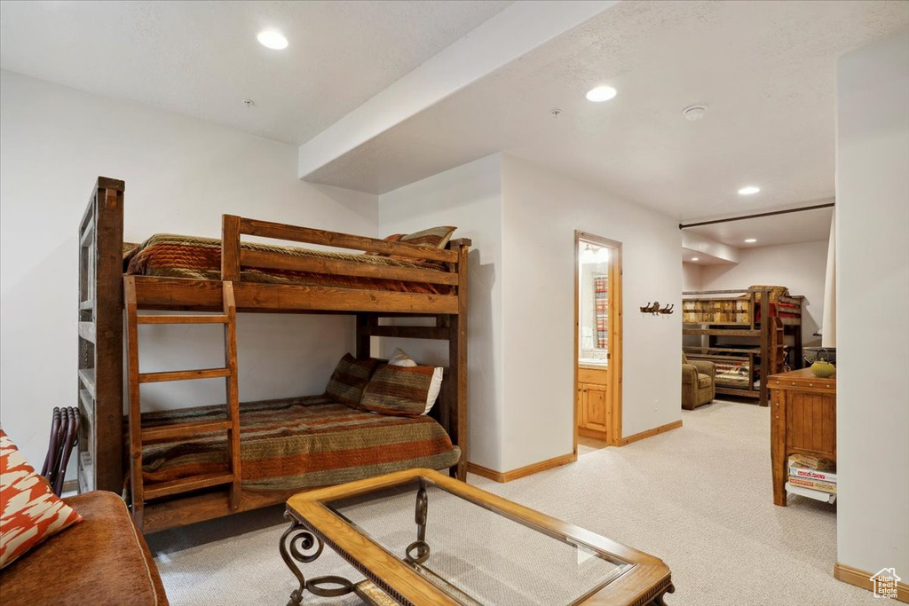 Bedroom featuring recessed lighting, light carpet, and baseboards