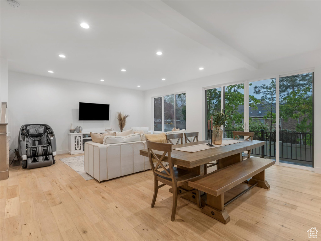 Dining area featuring baseboards, recessed lighting, and light wood-style flooring