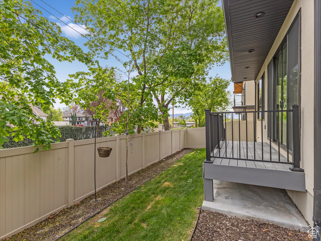 View of yard with a fenced backyard