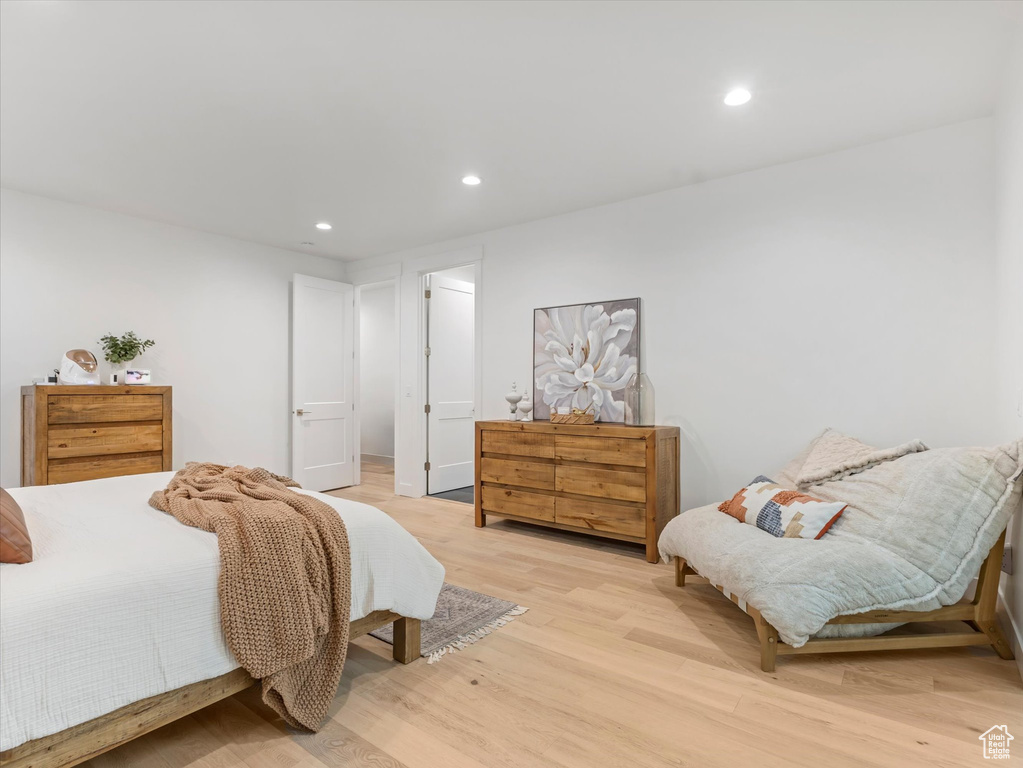 Bedroom featuring light wood-style floors and recessed lighting