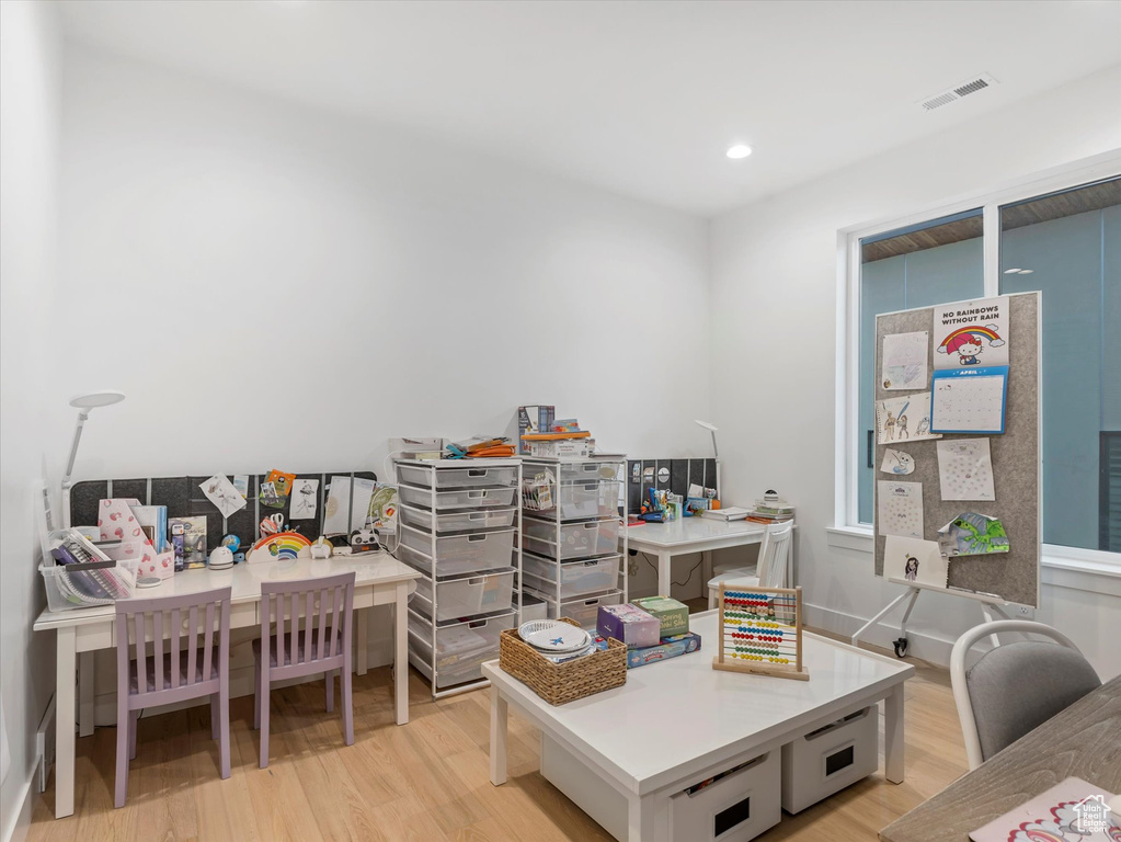 Home office featuring visible vents, recessed lighting, and light wood-style floors
